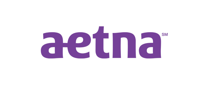 Aetna logo in purple on a black background, wordmark only or brand emblem included in the image.