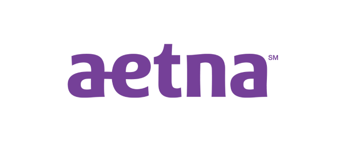 Aetna logo in purple on a black background, wordmark only or brand emblem included in the image.