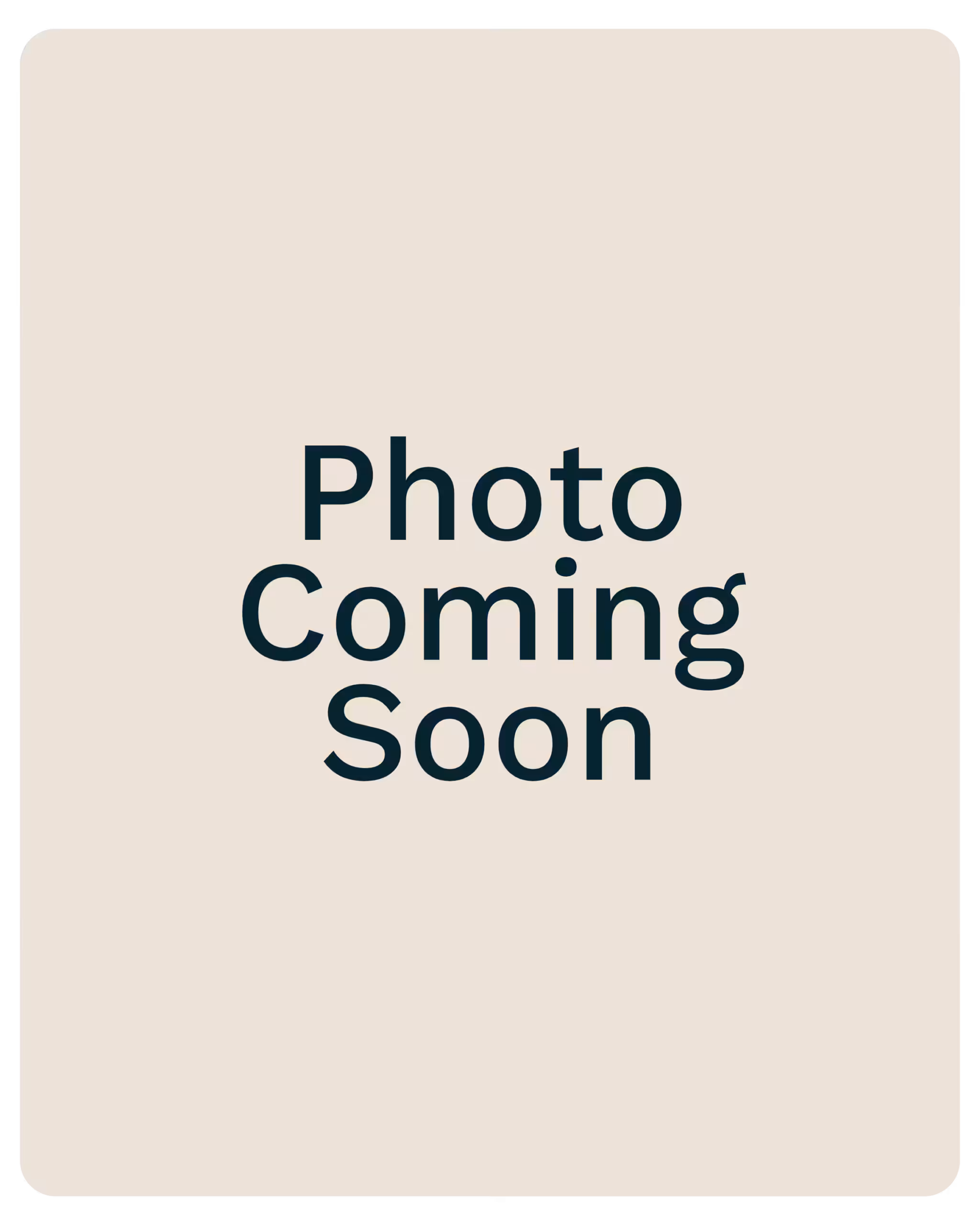 Placeholder image with a beige rounded rectangle background and large dark text reading 'Photo Coming Soon'.